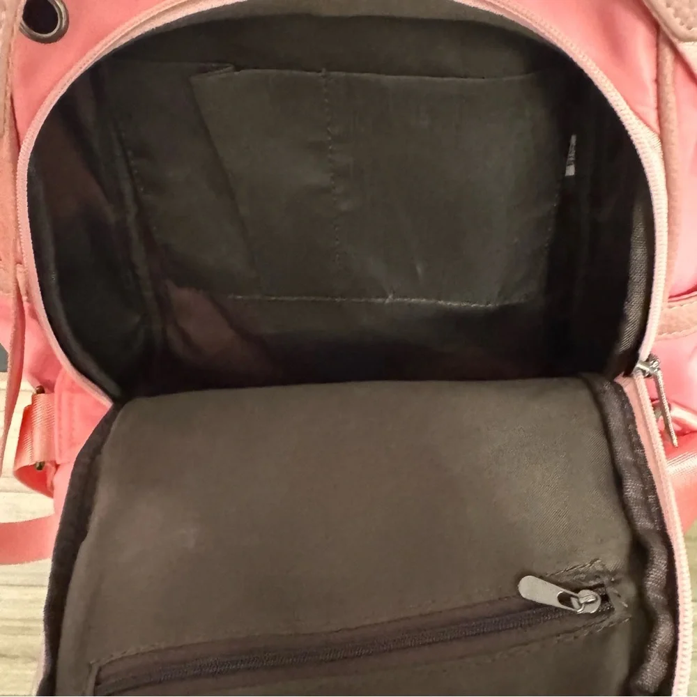 🎀 Coral Pink Nylon Backpack with Embossed Medallion Logo 🎀
